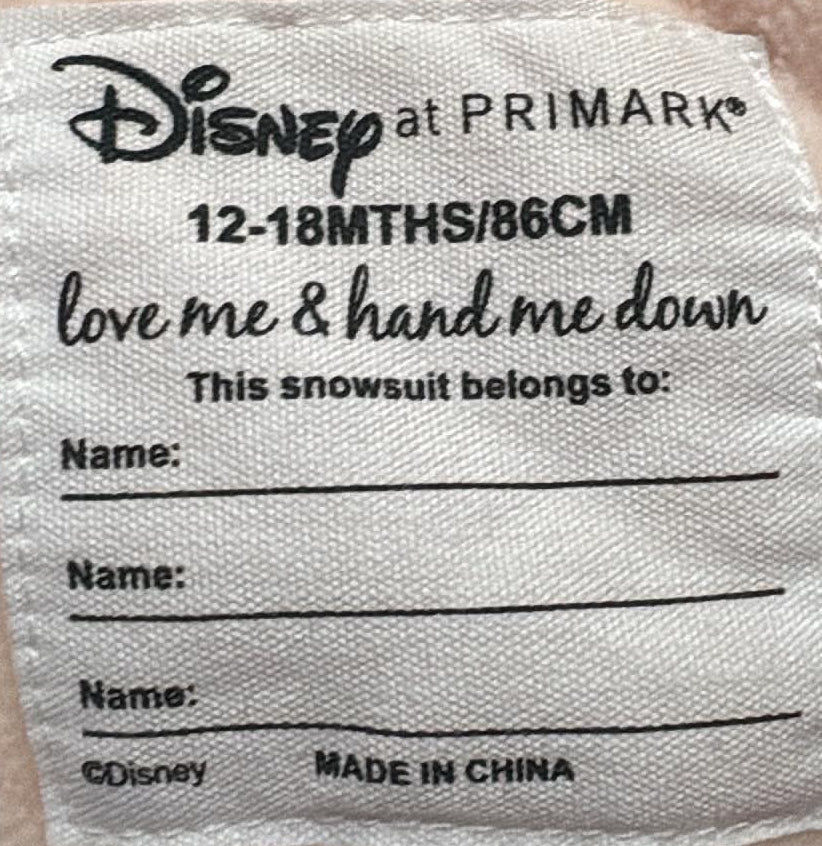 Disney at Primark snowsuit label showing 12–18 months and 86 cm