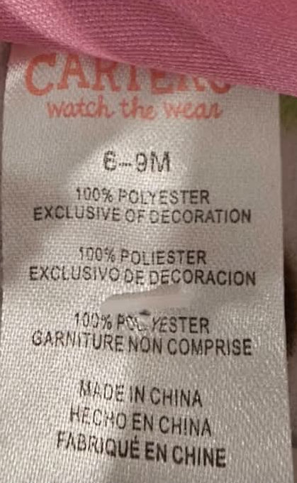 Carter’s Watch the Wear 6–9 months label and fabric information