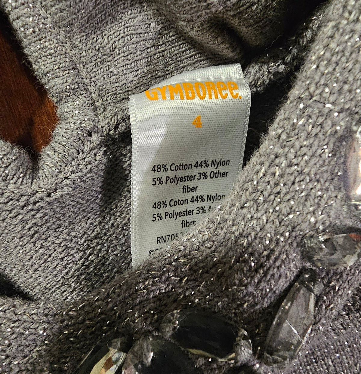 Gymboree tag, size 4, with jewel neckline detail
