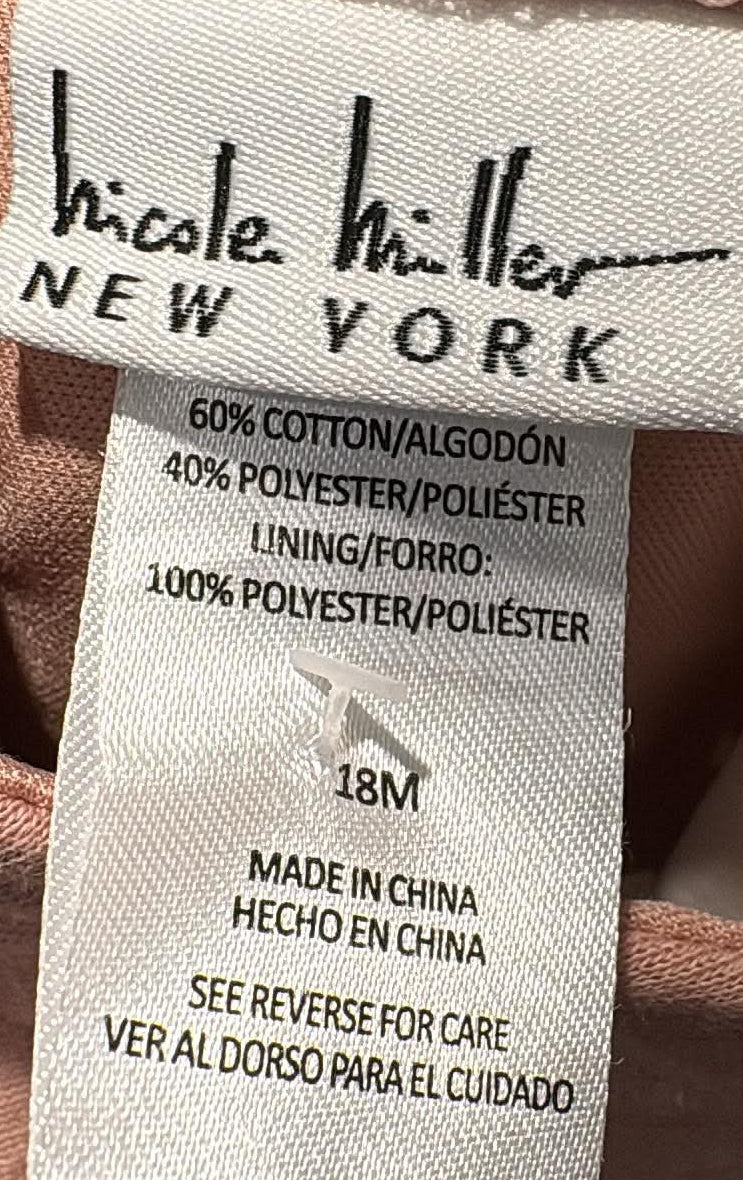 Nicole Miller New York label showing size 18 months and fabric composition