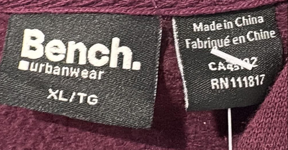 Bench hoodie label and eleven dollar price tag