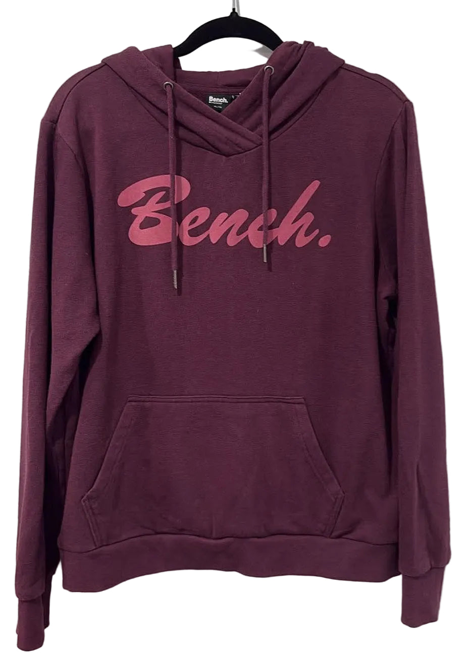 Front of burgundy Bench youth hoodie with pink script logo
