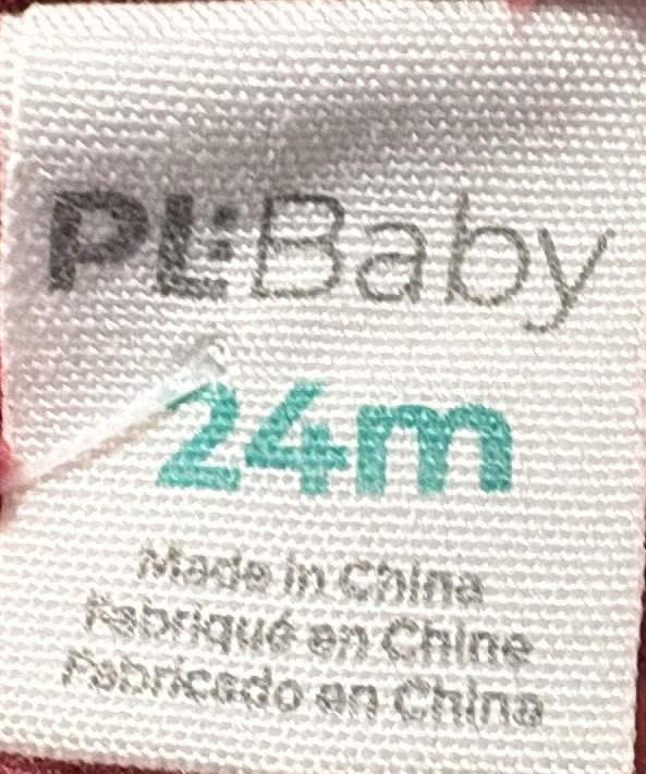 PL Baby brand label showing size 24 months