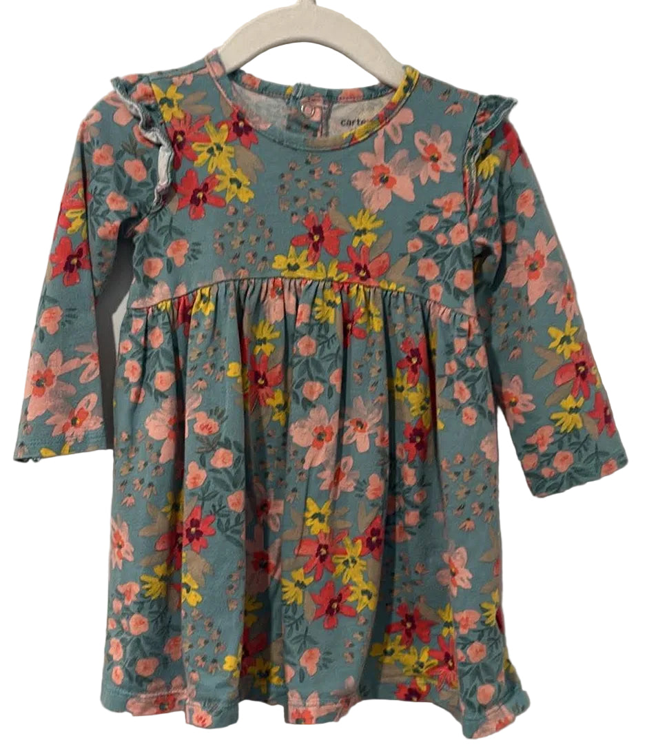 Front of teal Carter’s floral dress with long sleeves and ruffled shoulders