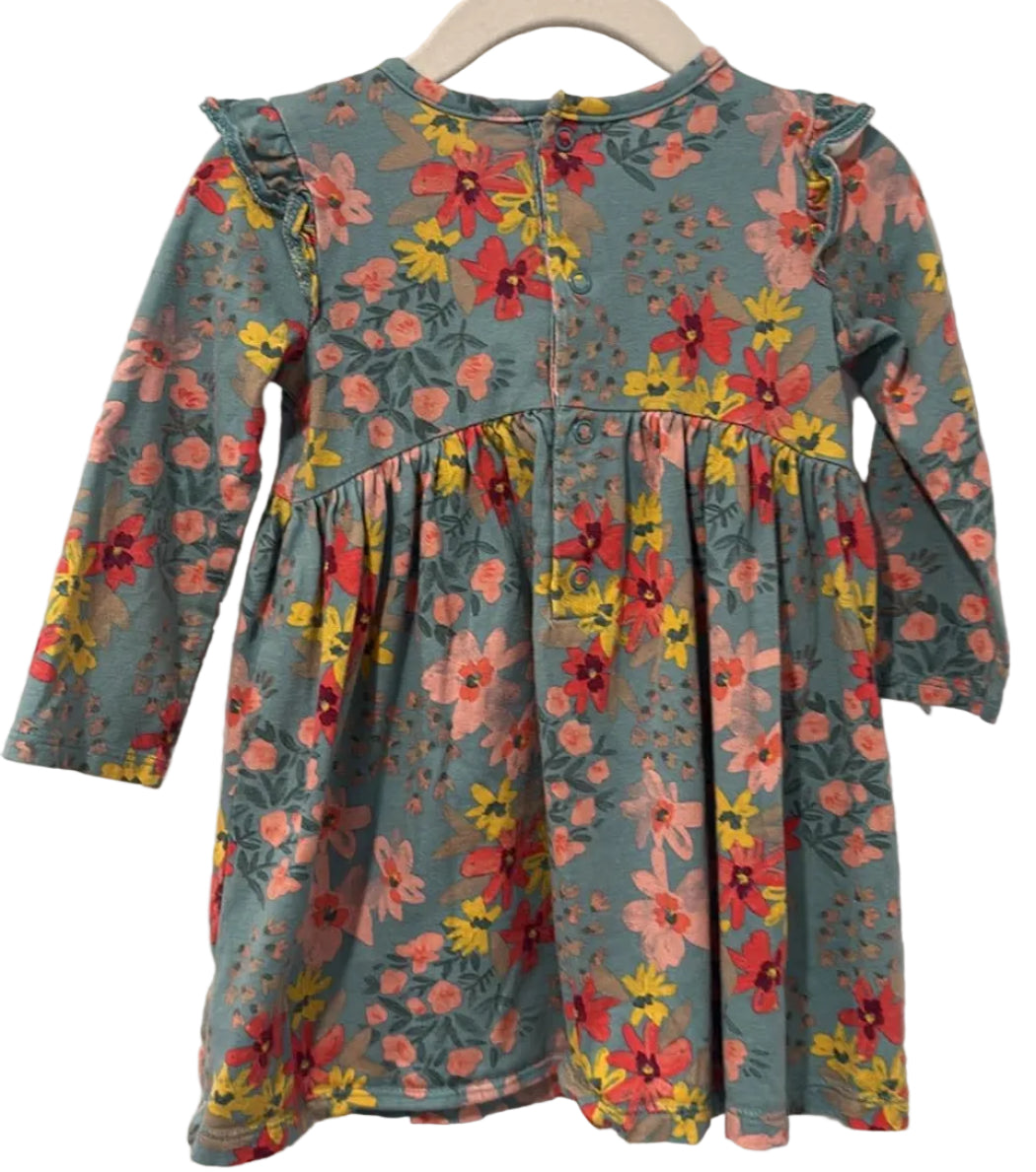Back of Carter’s floral dress showing snap closure
