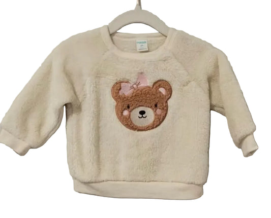 Front of cream Pekkle bear pullover