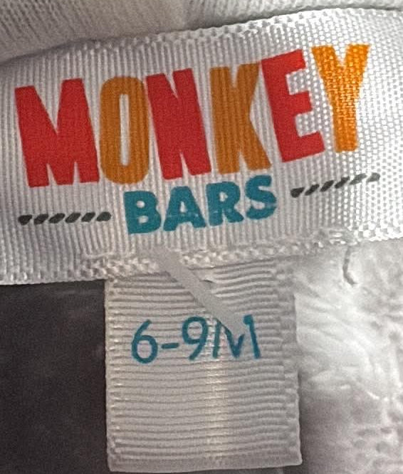 Back of Monkey Bars star-print pram suit