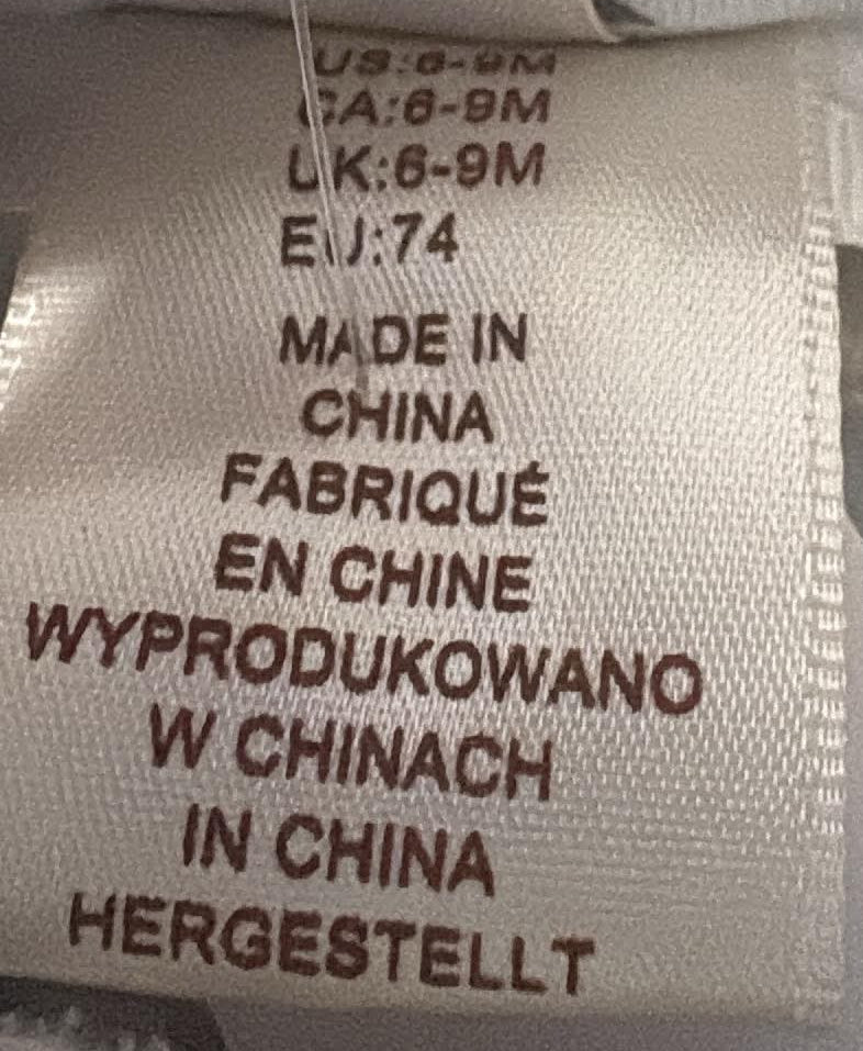 Size label showing 6–9 months