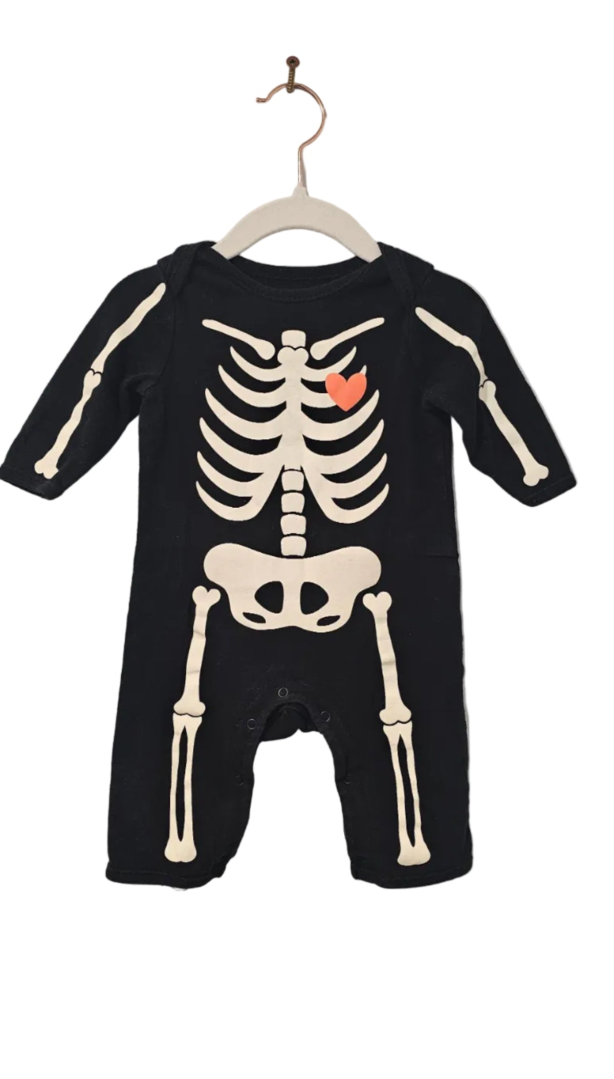Black Old Navy skeleton romper with white bones and orange heart, size 3–6 months