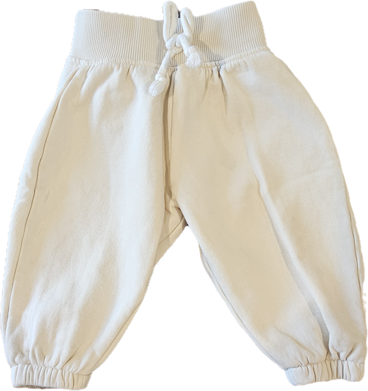 Cream Souris Mini baby pants with ribbed waistband and gathered ankle cuffs