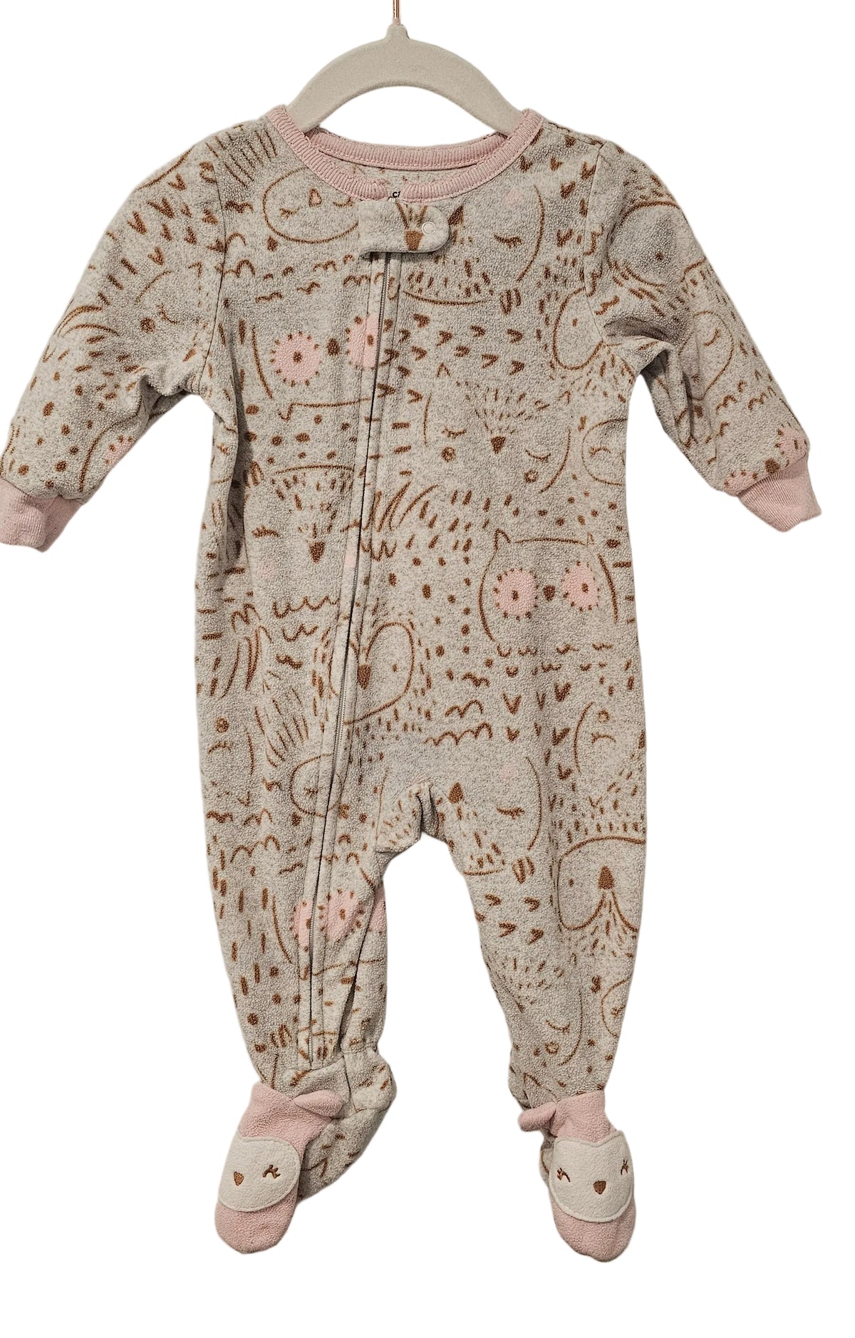 Carter’s owl-print footed sleeper with pale pink trim and owl-face feet