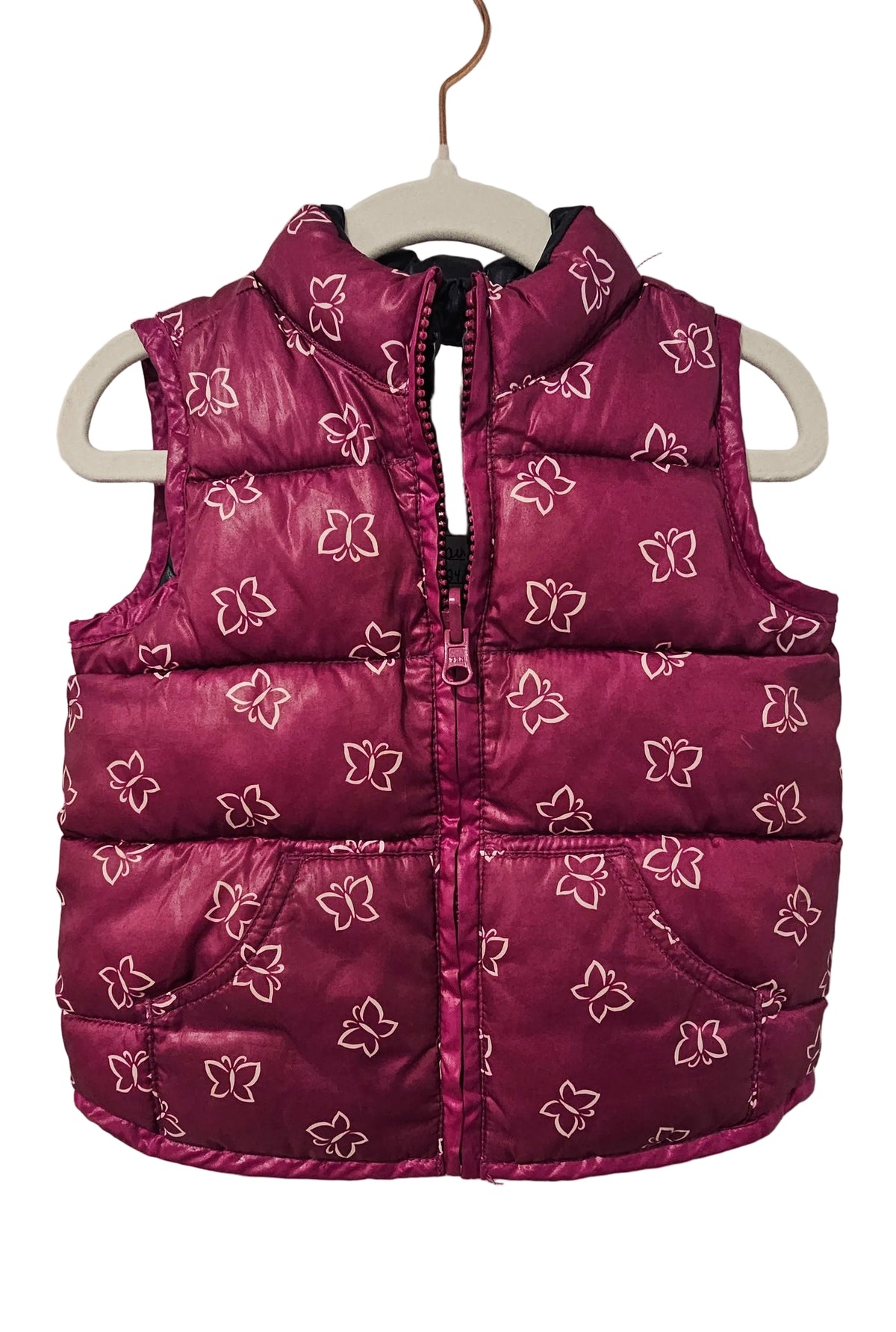 Old Navy berry-purple butterfly print puffer vest, front view