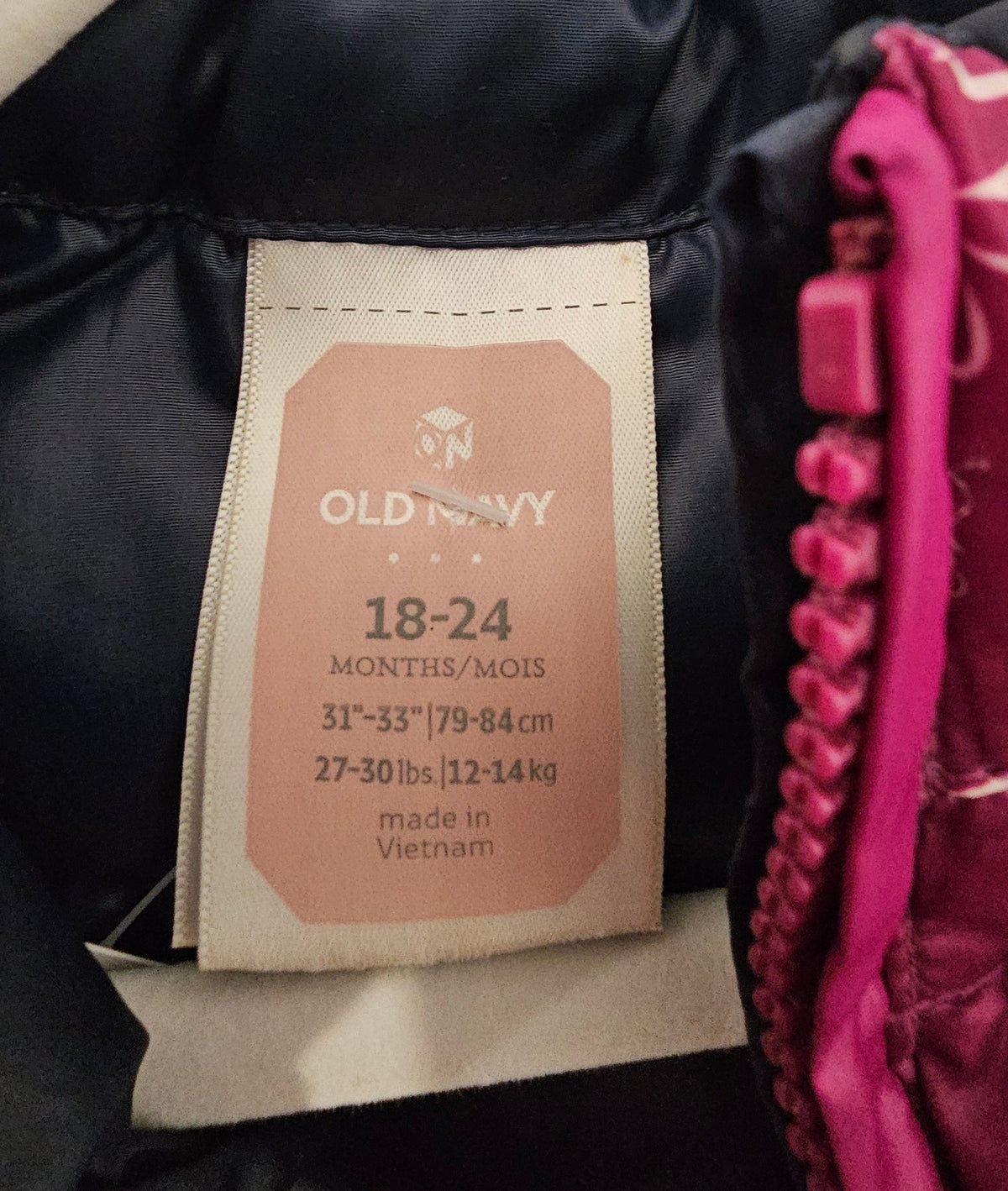 Old Navy label showing size 18–24 months