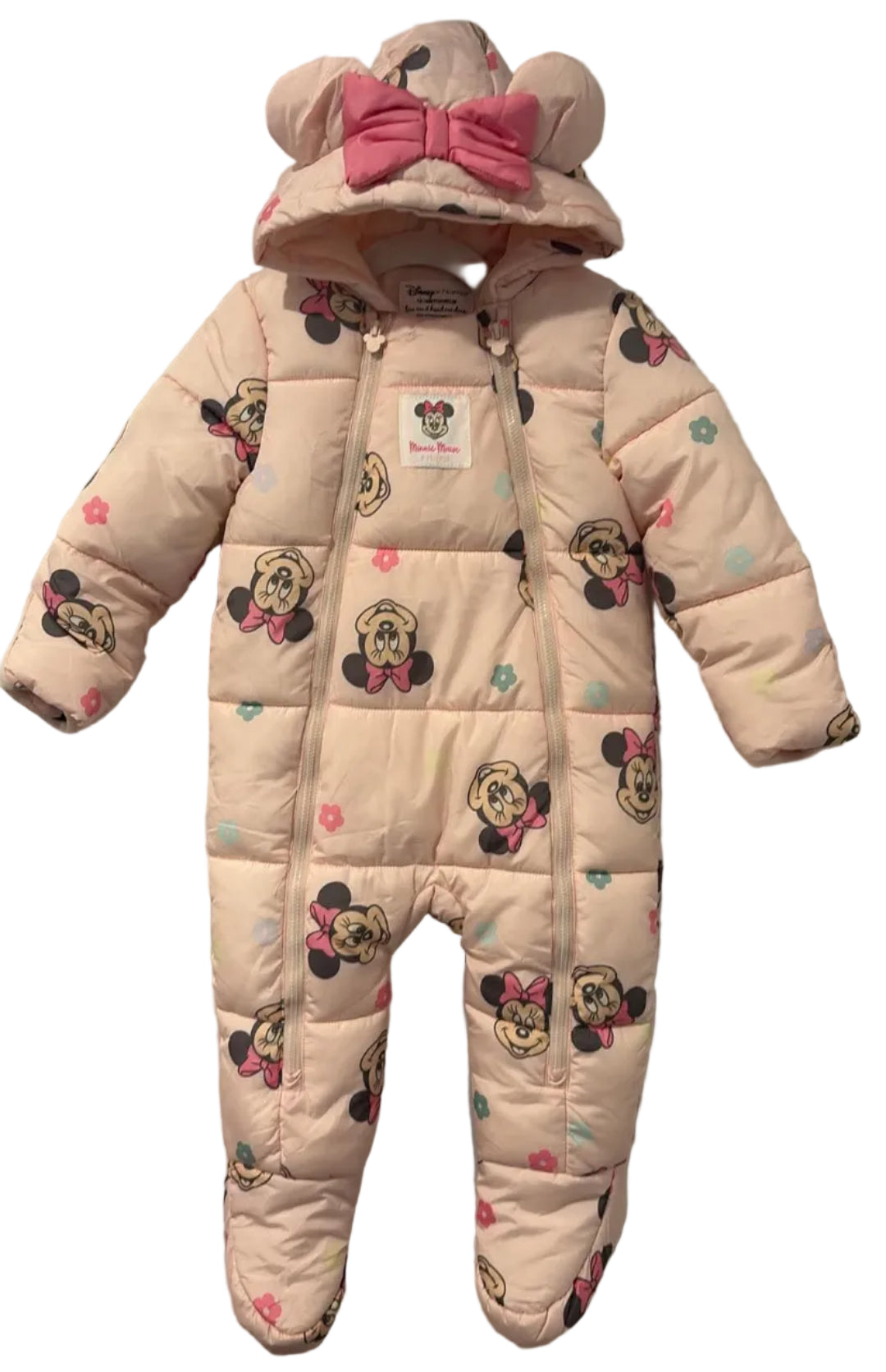Front of pale-pink Minnie Mouse snowsuit with hood ears and pink bow