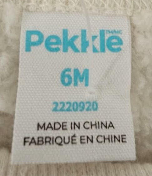 Pekkle size label showing 6 months