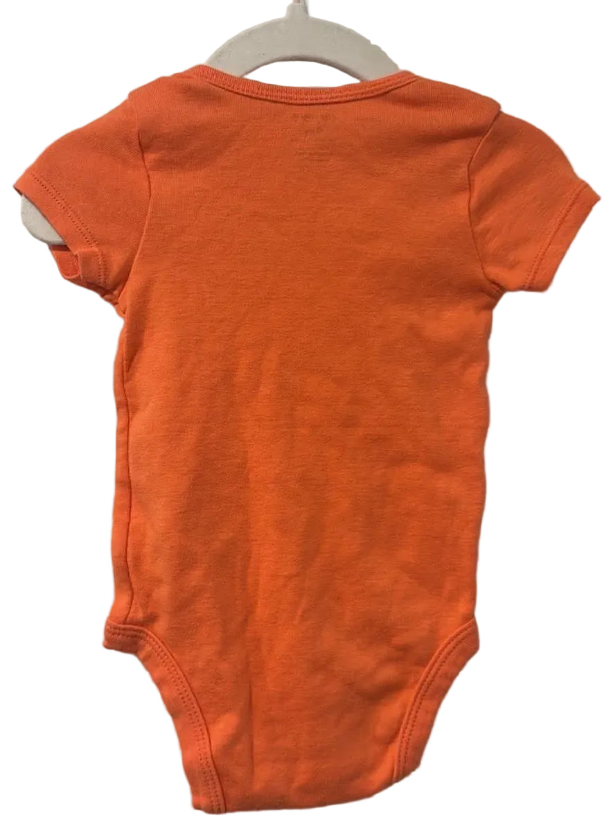 Back of orange Carter’s baby bodysuit