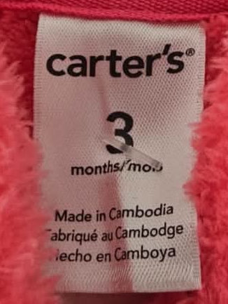 Carter’s 3 months size label and decorative buttons