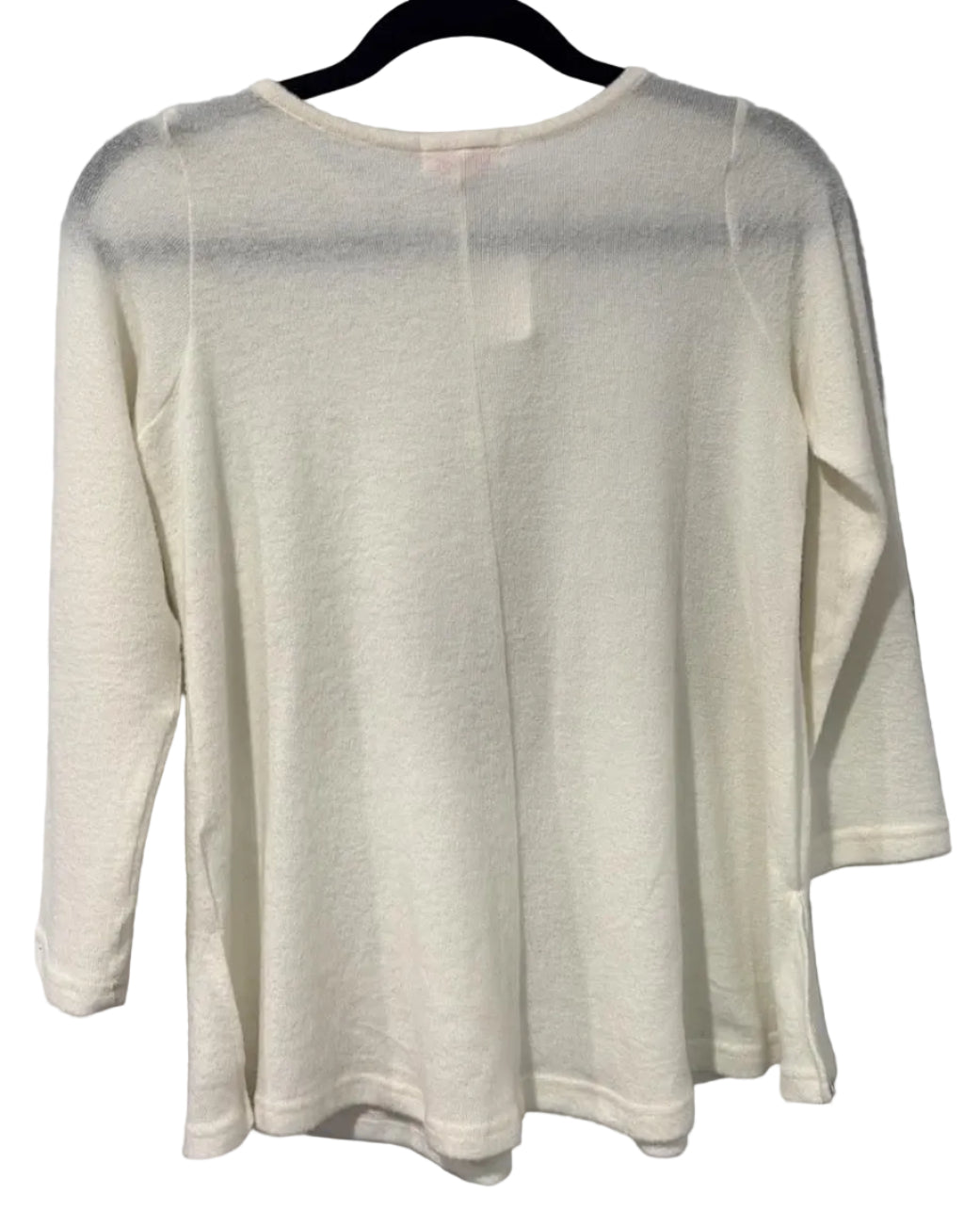 Back of cream Poof Girl long sleeve top