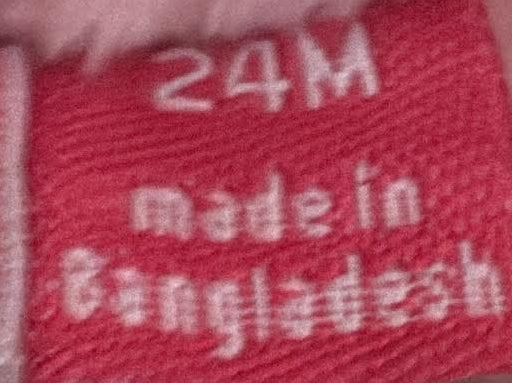 Penelope Mack size label showing 24 months