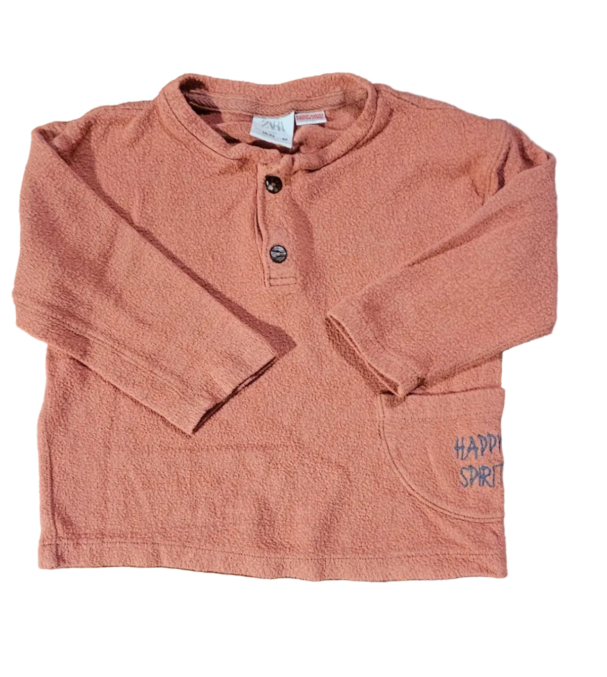 Salmon pink textured long-sleeve henley top