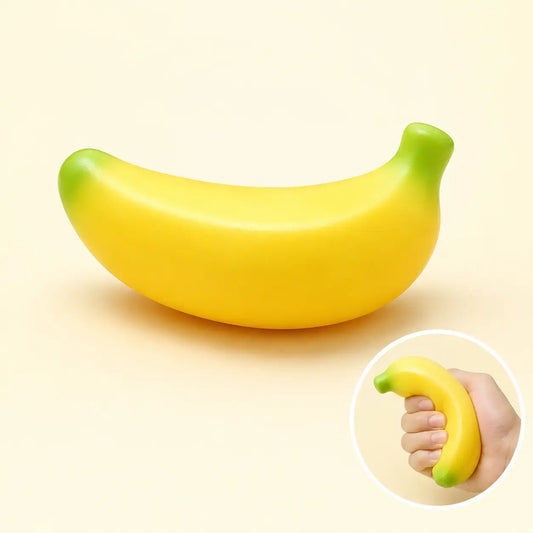 Yellow banana-shaped squeeze toy with green ends and no face
