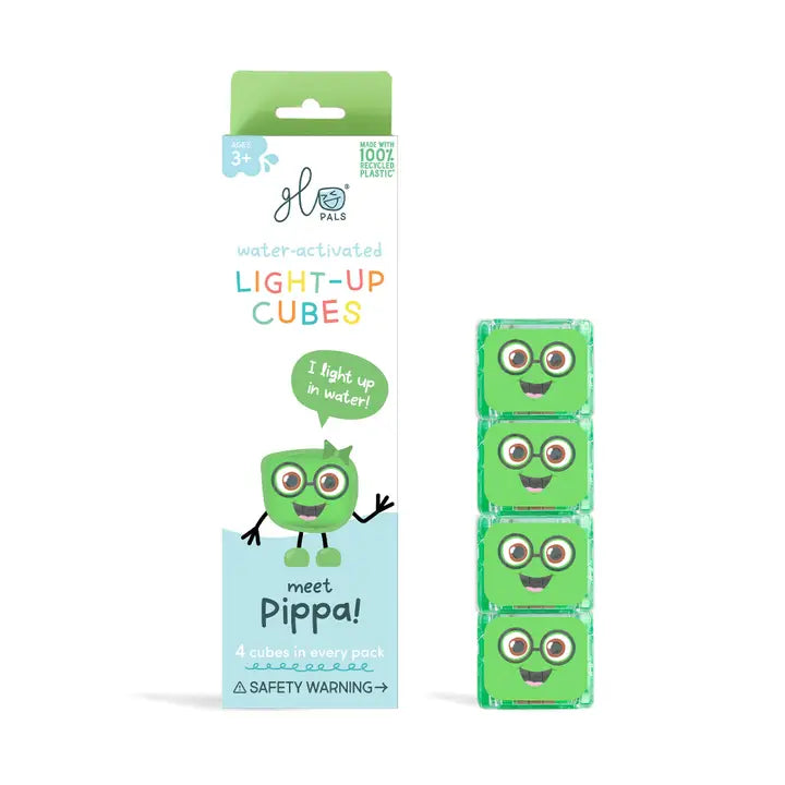 Four green Glo Pals Pippa light-up cubes beside their packaging