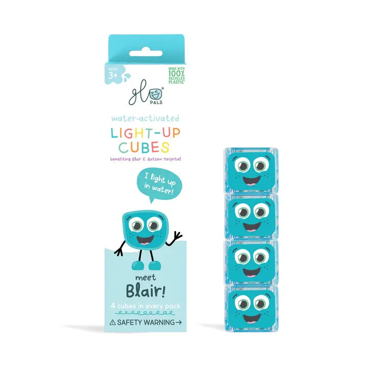 Four blue Glo Pals Blair light-up cubes beside their packaging